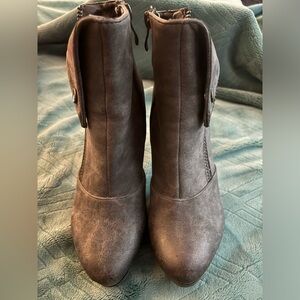 Stylish heeled black booties